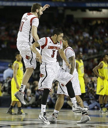 Trey Burke (3), Tim Hardaway Jr. (10), and Glenn Robinson III (1)