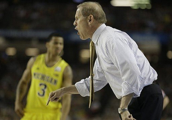 Trey Burke (3) and John Beilein