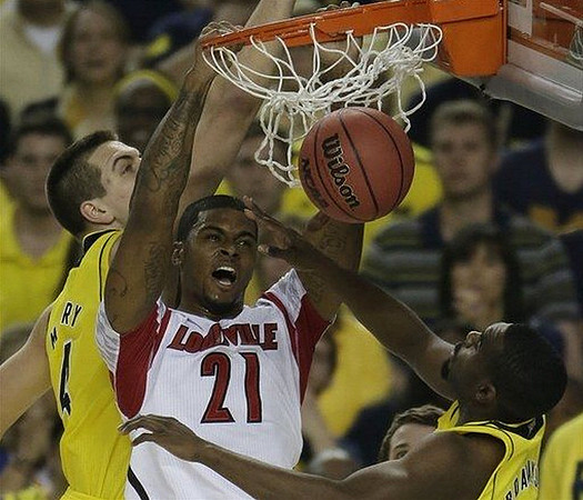 Mitch McGary (4) and Tim Hardaway Jr. (10)