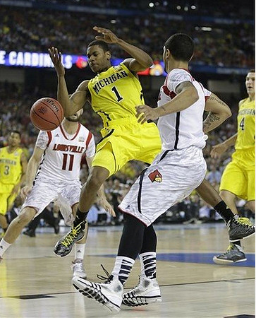Trey Burke (3), Glenn Robinson III (1), and Mitch McGary (4)