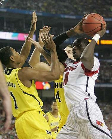 Glenn Robinson III (1) and Mitch McGary (4)