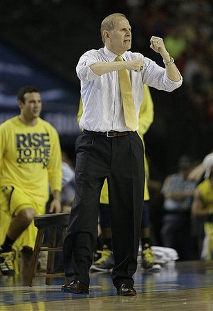 Josh Bartelstein (20) and John Beilein
