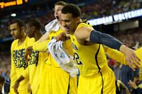 Jon Horford (15), Caris LeVert (23), Nik Stauskas (11), and Jordan Morgan (52)