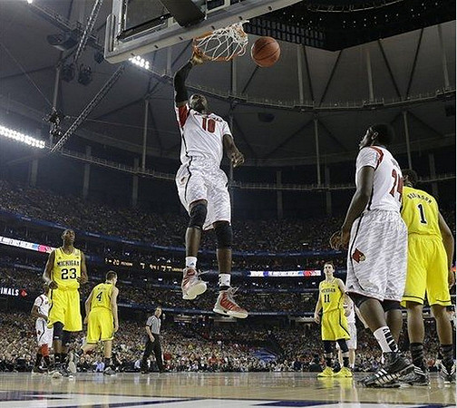 Caris LeVert (23), Mitch McGary (4), Nik Stauskas (11), and Glenn Robinson III (1)