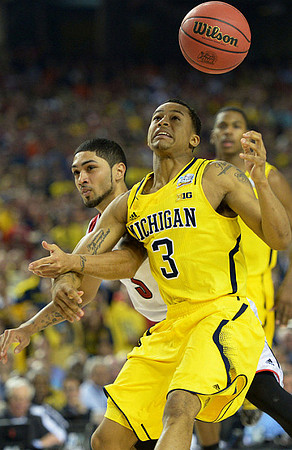 Trey Burke (3) and Glenn Robinson III (1)