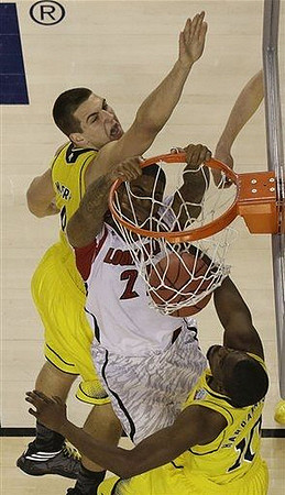 Mitch McGary (4) and Tim Hardaway Jr. (10)