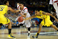 Jon Horford (15) and Trey Burke (3)
