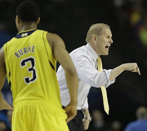 Trey Burke (3) and John Beilein