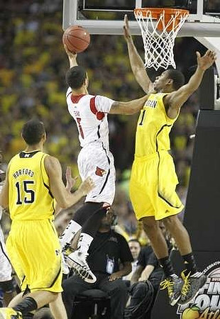 Jon Horford (15) and Glenn Robinson III (1)