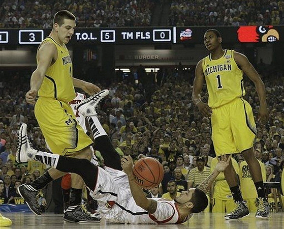 Mitch McGary (4) and Glenn Robinson III (1)