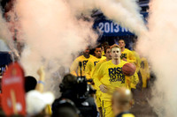 Blake McLimans (22), Josh Bartelstein (20), Trey Burke (3), Tim Hardaway Jr. (10), and Mitch McGary (4)