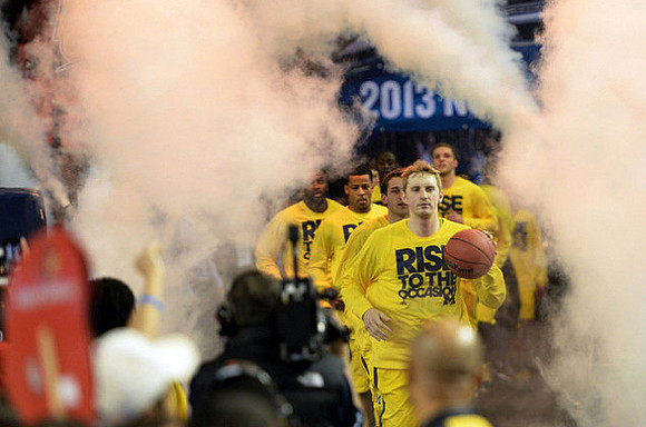 Blake McLimans (22), Josh Bartelstein (20), Trey Burke (3), Tim Hardaway Jr. (10), and Mitch McGary (4)
