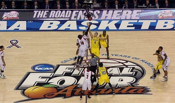 Tim Hardaway Jr. (10), Mitch McGary (4), Glenn Robinson III (1), and Trey Burke (3)