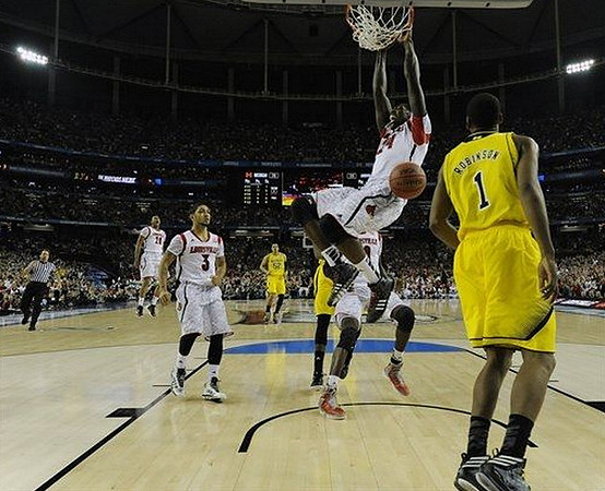 Jordan Morgan (52) and Glenn Robinson III (1)