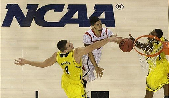 Mitch McGary (4) and Glenn Robinson III (1)