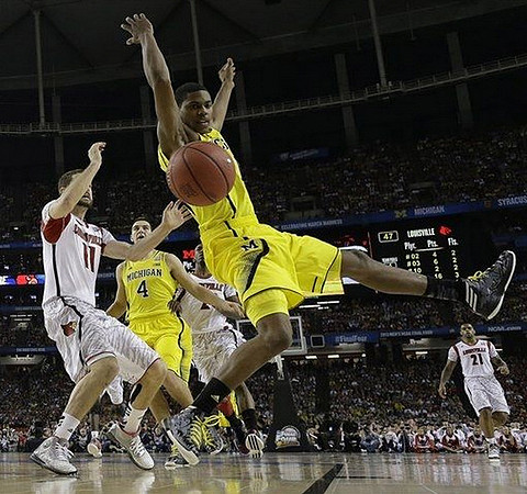 Mitch McGary (4) and Glenn Robinson III (1)
