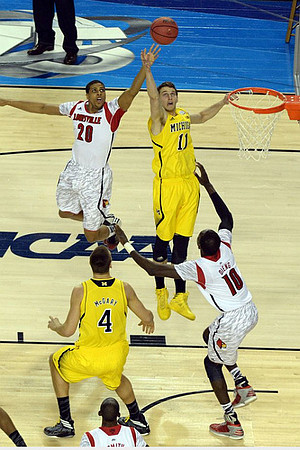 Mitch McGary (4) and Nik Stauskas (11)