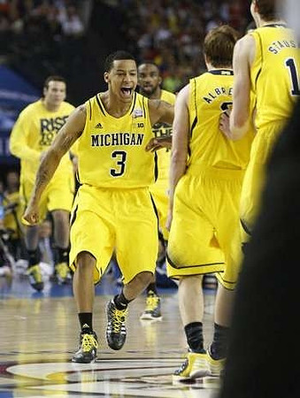 Josh Bartelstein (20), Trey Burke (3), Corey Person (32), Spike Albrecht (2), and Nik Stauskas (11)