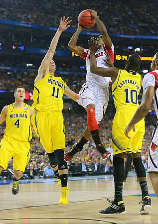 Mitch McGary (4), Nik Stauskas (11), and Tim Hardaway Jr. (10)