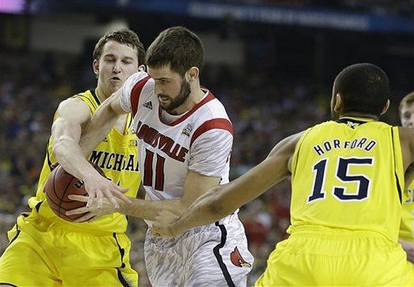 Nik Stauskas (11) and Jon Horford (15)