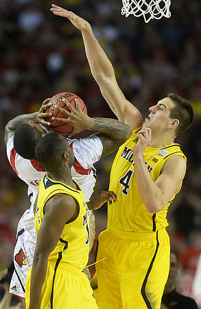 Tim Hardaway Jr. (10) and Mitch McGary (4)