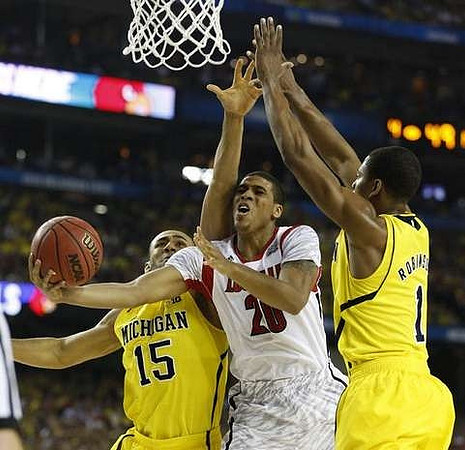 Jon Horford (15) and Glenn Robinson III (1)