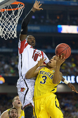 Trey Burke (3) and Mitch McGary (4)