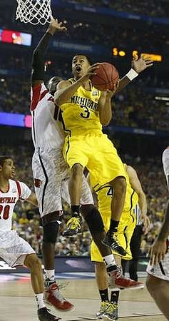 Trey Burke (3) and Spike Albrecht (2)
