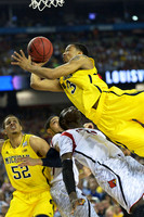 Jordan Morgan (52) and Trey Burke (3)