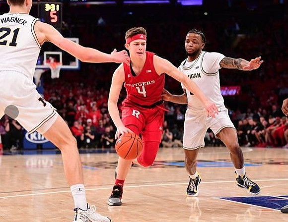 Franz Wagner (21) and Zavier Simpson (3)