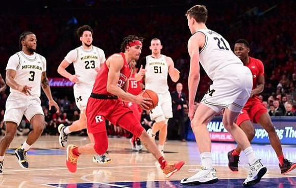 Zavier Simpson (3), Brandon Johns Jr. (23), Austin Davis (51), and Franz Wagner (21)