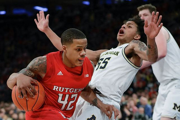 Eli Brooks (55) and Jon Teske (15)