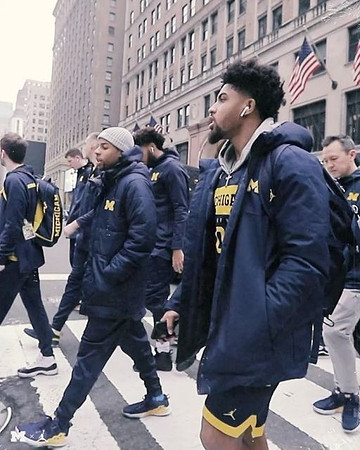 David DeJulius (0) and Michigan Team
