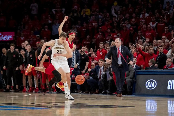 Franz Wagner (21) and Rutgers Head Coach Steve Pikiell