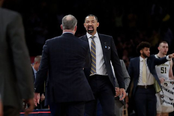 Rutgers Head Coach Steve Pikiell, Juwan Howard, Isaiah Livers (2), and Austin Davis (51)