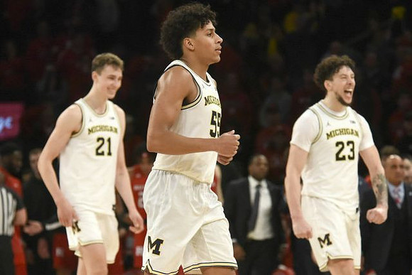 Franz Wagner (21), Eli Brooks (55), and Brandon Johns Jr. (23)