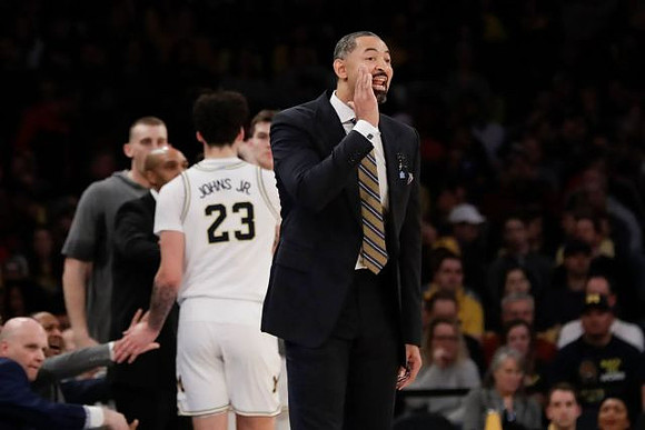 Juwan Howard and Michigan Team