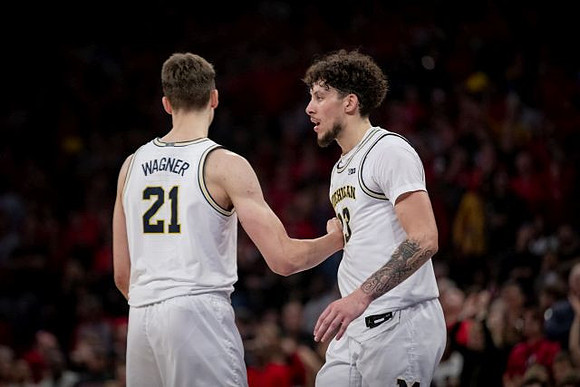 Franz Wagner (21) and Brandon Johns Jr. (23)
