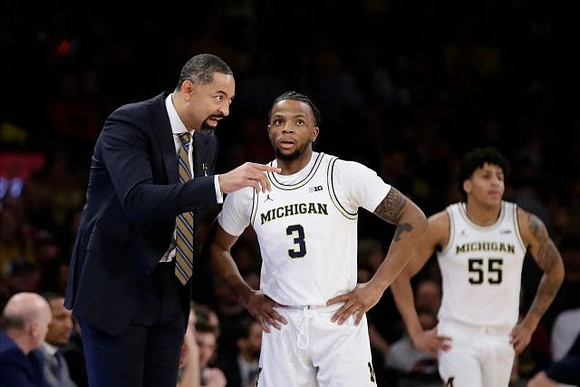 Juwan Howard, Zavier Simpson (3), Eli Brooks (55), and David DeJulius (0)