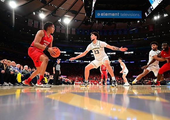 Brandon Johns Jr. (23), Adrien Nunez (5), and David DeJulius (0)