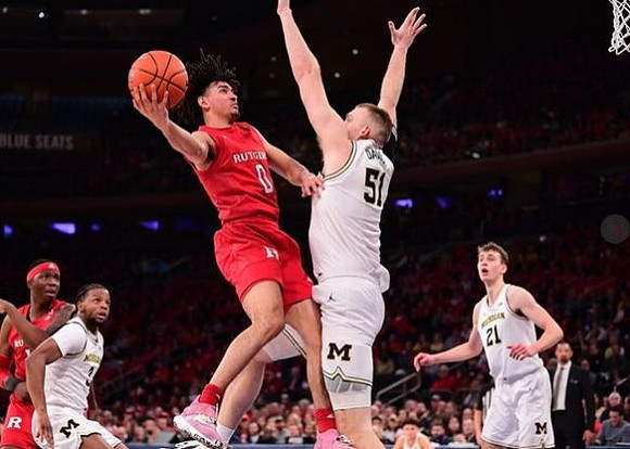 Zavier Simpson (3), Austin Davis (51), and Franz Wagner (21)