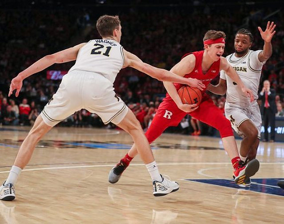 Franz Wagner (21) and Zavier Simpson (3)