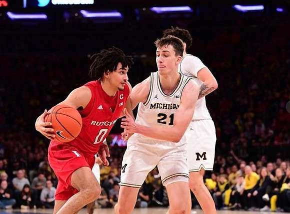 Franz Wagner (21) and Brandon Johns Jr. (23)