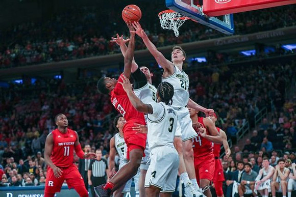 Eli Brooks (55), Austin Davis (51), Zavier Simpson (3), and Franz Wagner (21)