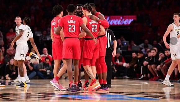 Zavier Simpson (3), Austin Davis (51), and Franz Wagner (21)