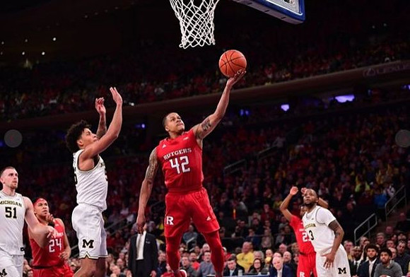 Austin Davis (51), Eli Brooks (55), and Zavier Simpson (3)