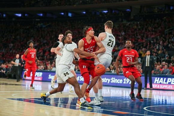 Austin Davis (51), Zavier Simpson (3), Brandon Johns Jr. (23), and Franz Wagner (21)