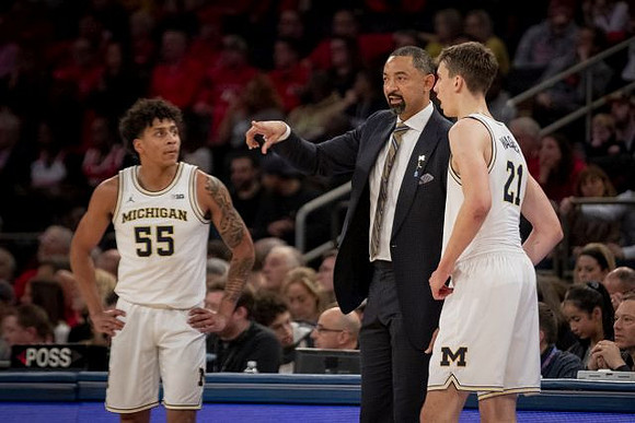 Eli Brooks (55), Juwan Howard, and Franz Wagner (21)