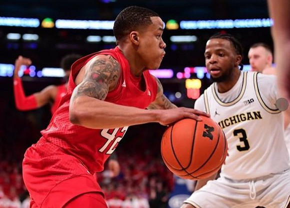 Zavier Simpson (3) and Austin Davis (51)