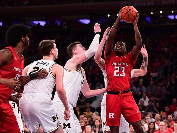 Zavier Simpson (3), Franz Wagner (21), Jon Teske (15), and Brandon Johns Jr. (23)